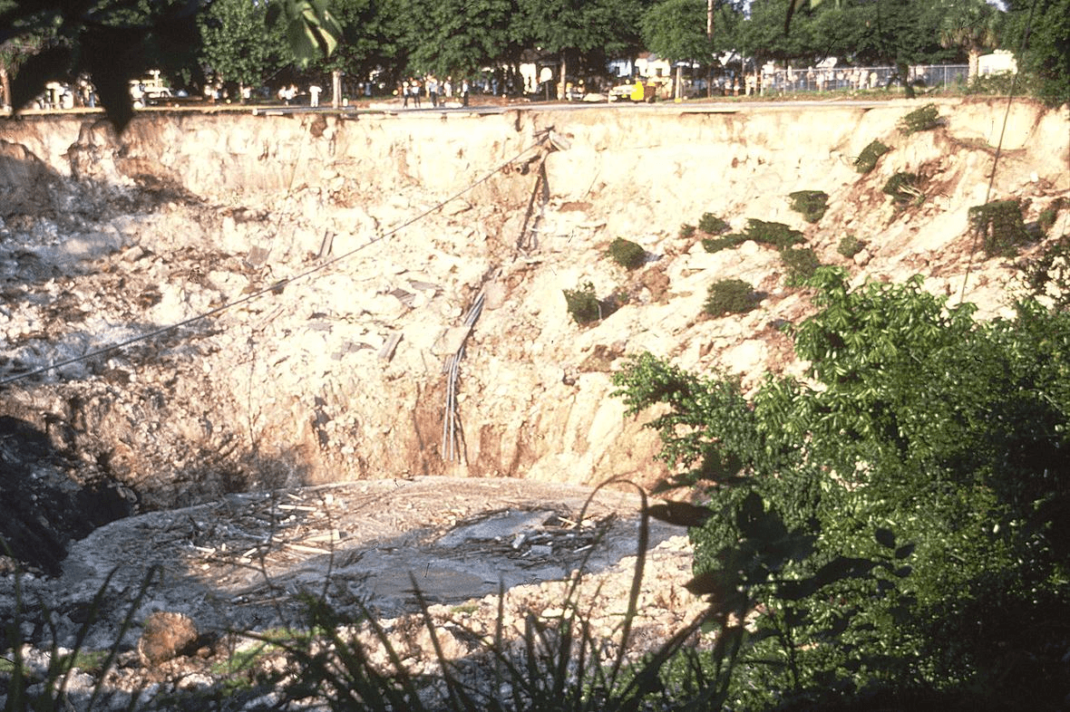 Cover-collapse sinkhole beside South Denning Drive in Winter Park, Florida, May 9, 1981
